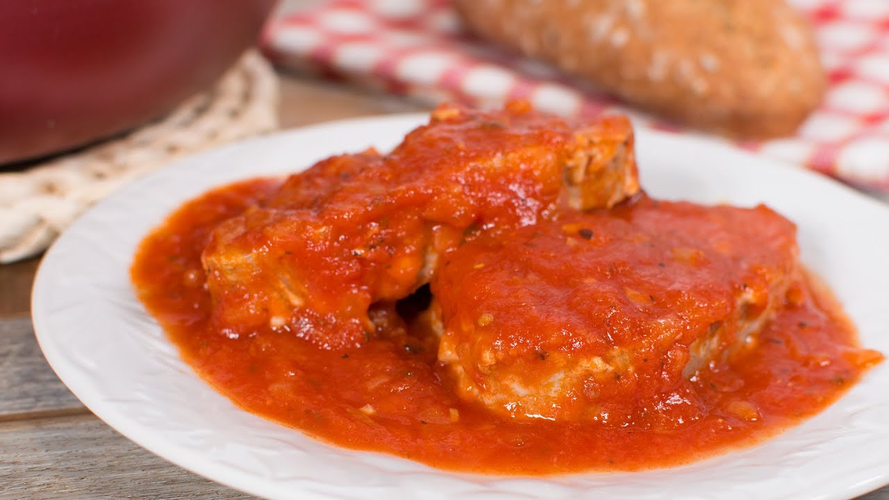 Atún con salsa de tomate cebolla y pimiento