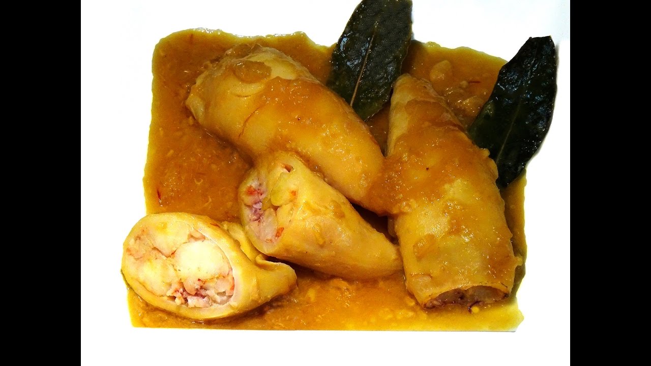 Calamares rellenos de gambas en salsa de cebolla: Deliciosa combinación marina