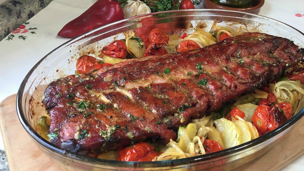 Receta de costillas de cerdo al horno con patatas y vino blanco