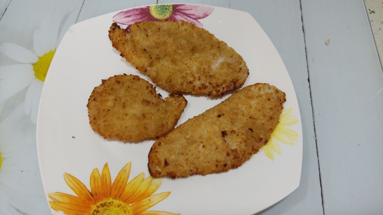 Filetes empanados cocidos en la freidora de aire Cosori
