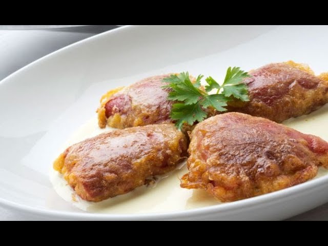 Gambas y bechamel en pimientos rellenos