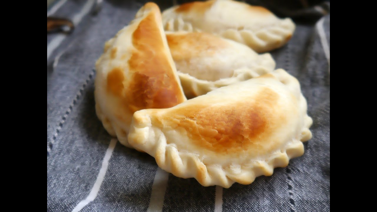 Preparación de empanadillas horneadas de jamón york y queso
